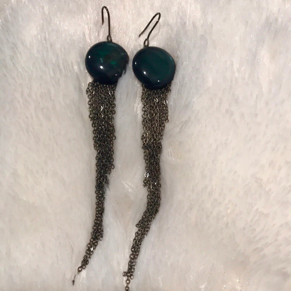 earring with beautiful green reflecting stone